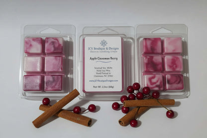 Apple Cinnamon Berry Soy Wax Melt packaging with pink wax cubes and cinnamon sticks.